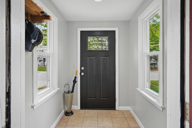 29 Emanual Dr, Brunswick, ME 04011 - foyer featuring baseboards, healthy amount of natural light, and light tile patterned flooring