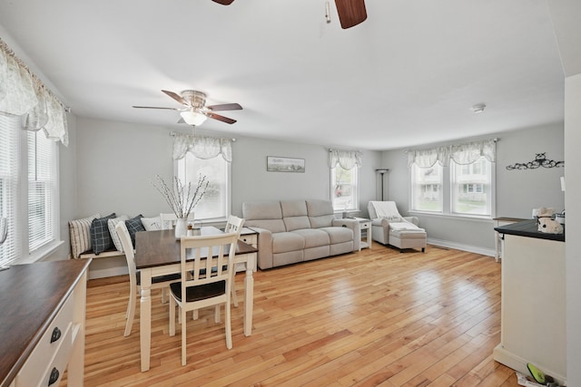 29 Emanual Dr, Brunswick, ME 04011 - living room featuring a ceiling fan, light wood finished floors, and baseboards