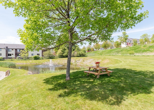 22 Cormorant Pl Unit 22, South Portland, ME 04106 - view of green lawn featuring a water view