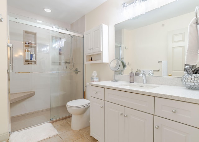 22 Cormorant Pl Unit 22, South Portland, ME 04106 - full bathroom featuring vanity, tile patterned flooring, a shower stall, toilet, and recessed lighting