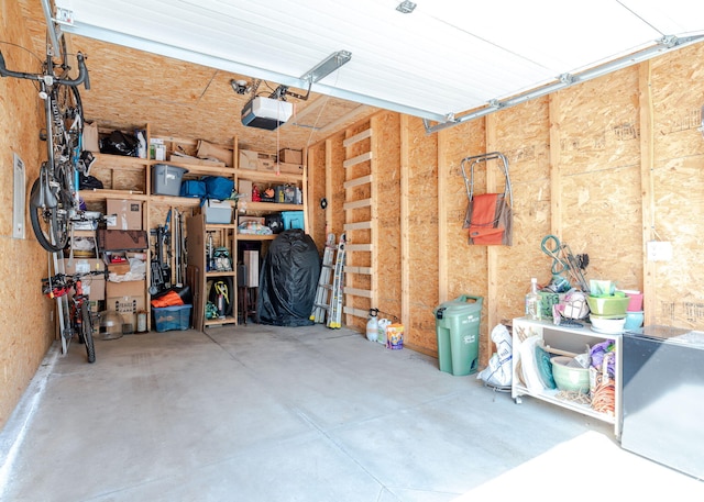 22 Cormorant Pl Unit 22, South Portland, ME 04106 - garage featuring a garage door opener