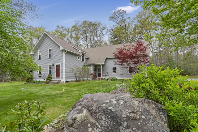 241 Old Stage Rd, Arrowsic, ME 04530 - view of front facade with roof with shingles, a front lawn, and entry steps