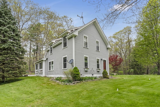 241 Old Stage Rd, Arrowsic, ME 04530 - view of side of home with a yard