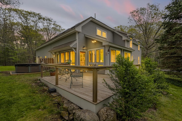 241 Old Stage Rd, Arrowsic, ME 04530 - rear view of property featuring a hot tub, a wooden deck, and a yard