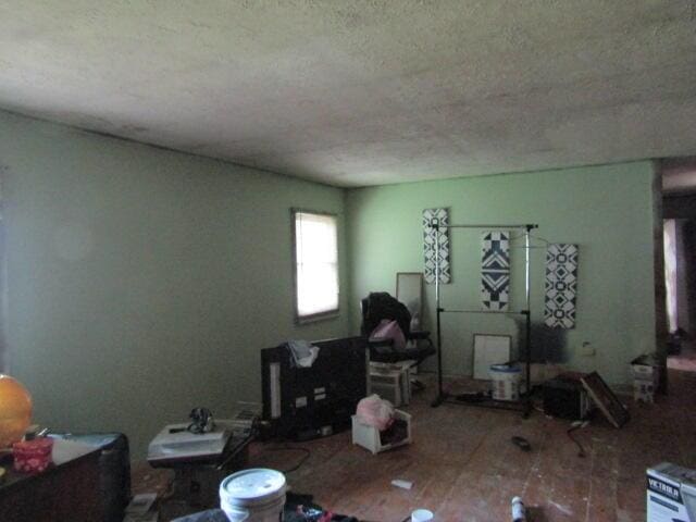 33 Log N Rock Rd, Eliot, ME 03442 - living room featuring a textured ceiling and an office area