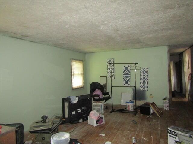 33 Log N Rock Rd, Eliot, ME 03442 - living room featuring hardwood / wood-style flooring and a textured ceiling
