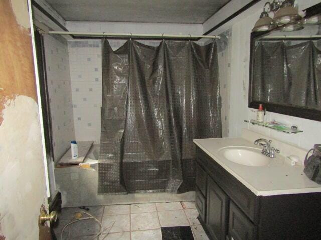 33 Log N Rock Rd, Eliot, ME 03442 - bathroom with a shower with shower curtain and vanity