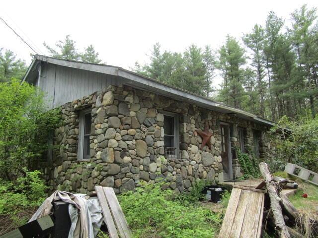 33 Log N Rock Rd, Eliot, ME 03442 - view of side of property with stone siding