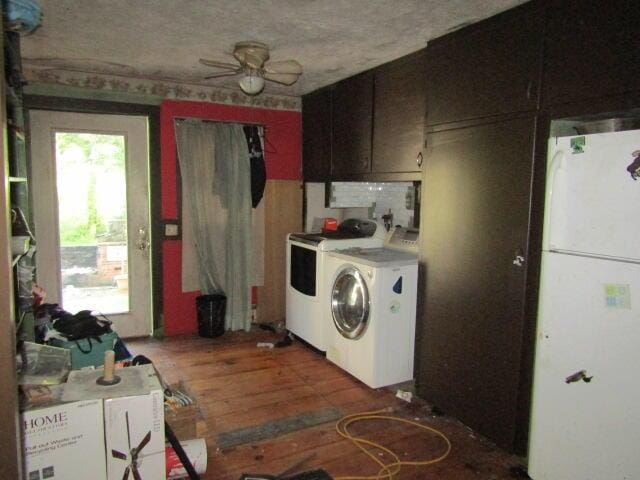 33 Log N Rock Rd, Eliot, ME 03442 - kitchen with freestanding refrigerator, washer and dryer, ceiling fan, light countertops, and wood finished floors