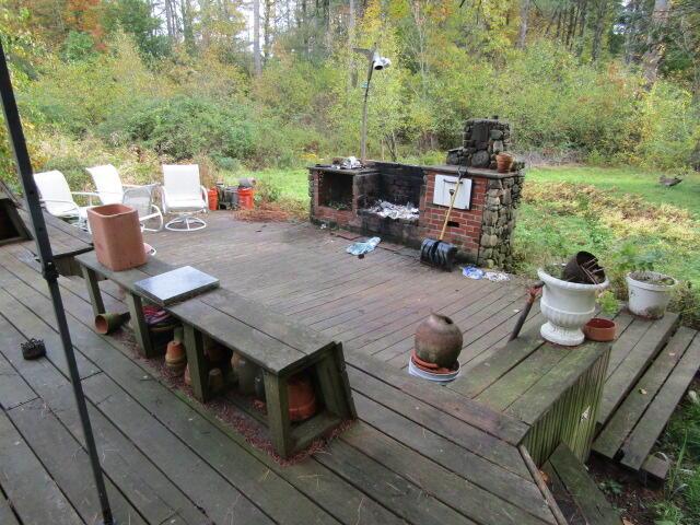 33 Log N Rock Rd, Eliot, ME 03442 - wooden deck with a forest view