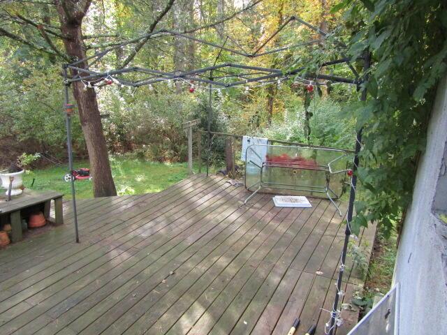 33 Log N Rock Rd, Eliot, ME 03442 - wooden terrace featuring a forest view