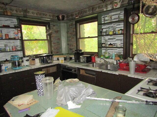 33 Log N Rock Rd, Eliot, ME 03442 - kitchen with tile countertops and a sink