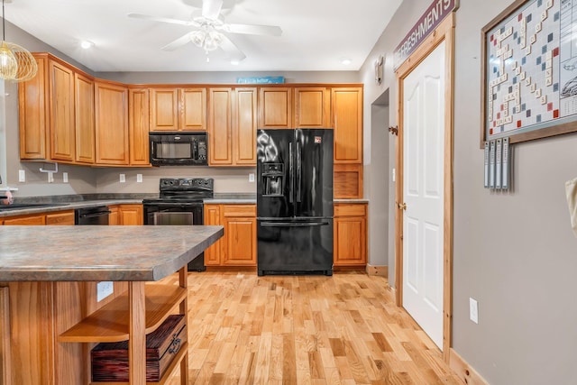 700 Pond Rd, Saint Albans, ME 04971 - kitchen with black appliances, light wood-style flooring, a sink, a ceiling fan, and recessed lighting