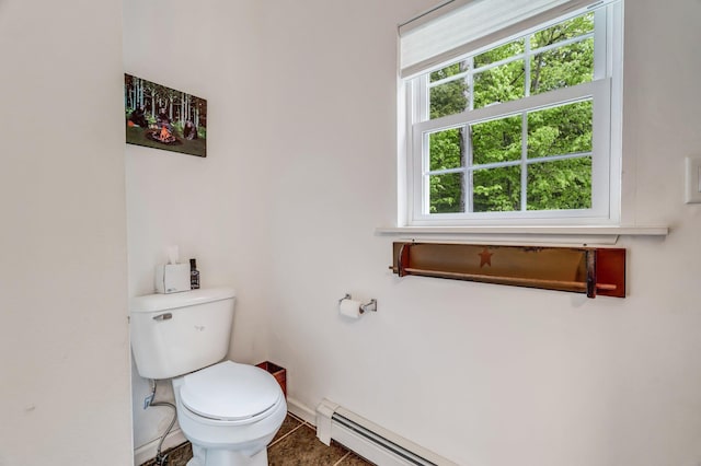 700 Pond Rd, Saint Albans, ME 04971 - bathroom featuring toilet, tile patterned floors, baseboards, and baseboard heating