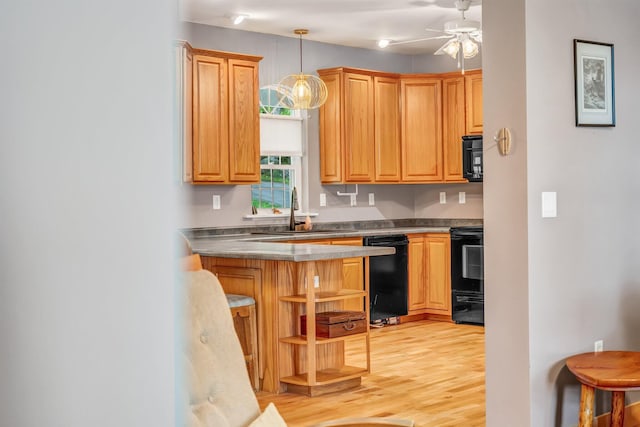 700 Pond Rd, Saint Albans, ME 04971 - kitchen featuring black appliances, open shelves, a sink, light wood finished floors, and ceiling fan