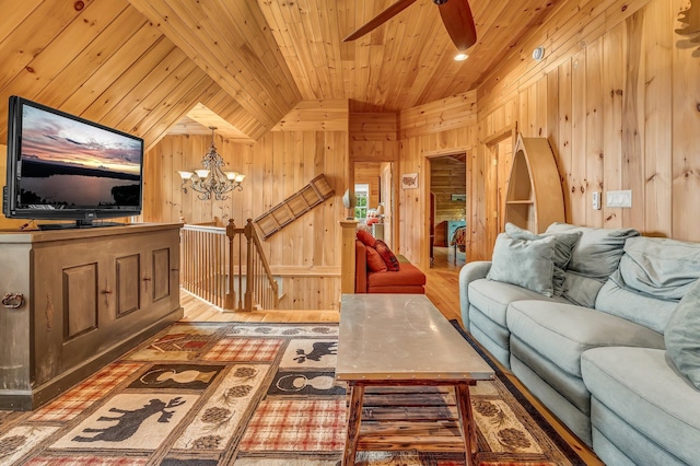700 Pond Rd, Saint Albans, ME 04971 - living area with wooden ceiling, wooden walls, a chandelier, lofted ceiling, and ceiling fan