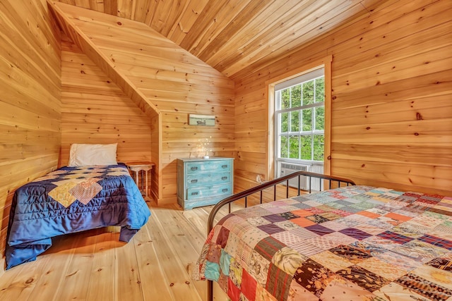 700 Pond Rd, Saint Albans, ME 04971 - bedroom featuring wood-type flooring, vaulted ceiling, wooden ceiling, and wooden walls