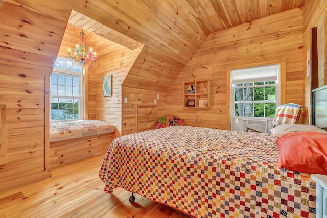 700 Pond Rd, Saint Albans, ME 04971 - bedroom with a chandelier, multiple windows, wood walls, wood finished floors, and wooden ceiling