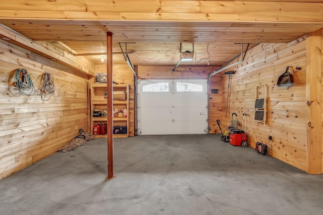 700 Pond Rd, Saint Albans, ME 04971 - garage with wood walls, wooden ceiling, and a garage door opener