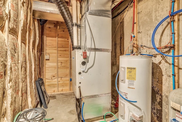 700 Pond Rd, Saint Albans, ME 04971 - utility room with electric water heater and heating unit