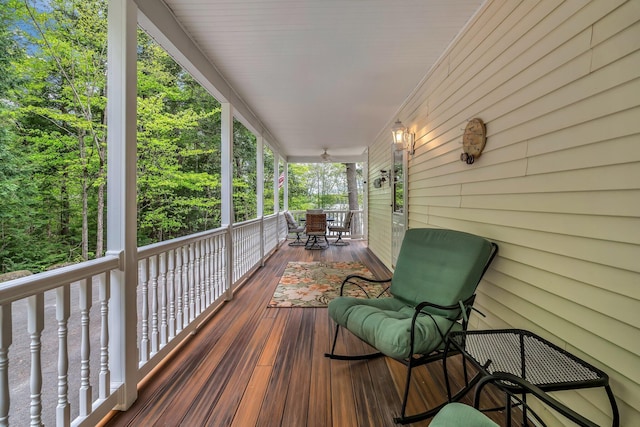 700 Pond Rd, Saint Albans, ME 04971 - wooden porch with outdoor dining space