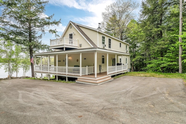 700 Pond Rd, Saint Albans, ME 04971 - country-style home with a porch