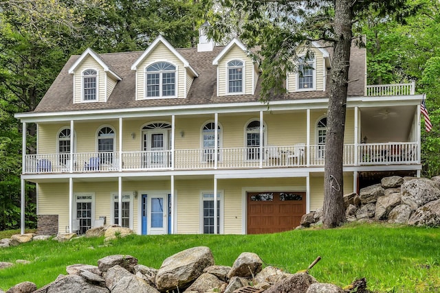 700 Pond Rd, Saint Albans, ME 04971 - view of front of home with a chimney, a garage, a balcony, and a shingled roof