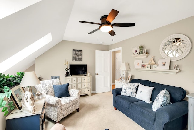 19 Winding Brook Ln S Unit 19, Wells, ME 04090 - living room with light carpet, ceiling fan, a skylight, and lofted ceiling