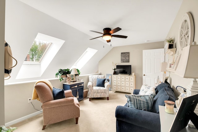 19 Winding Brook Ln S Unit 19, Wells, ME 04090 - living area featuring light colored carpet, a skylight, ceiling fan, vaulted ceiling, and baseboards