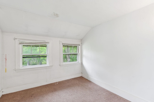 705707 Maine Ave, Farmingdale, ME 04344 - spare room with vaulted ceiling and carpet