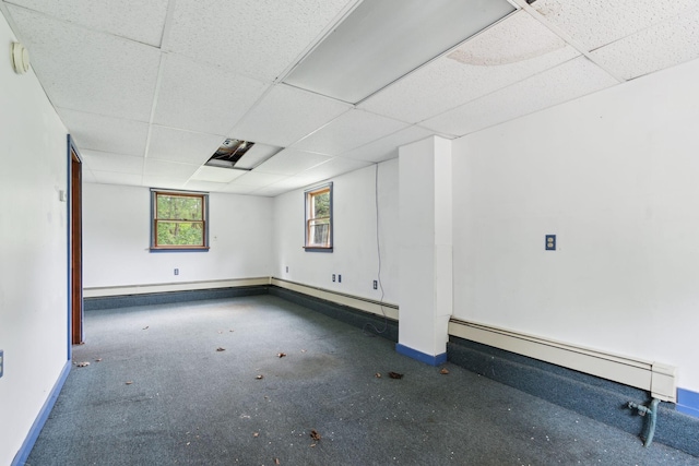 705707 Maine Ave, Farmingdale, ME 04344 - unfurnished room featuring a drop ceiling, a baseboard heating unit, baseboards, and a smoke detector