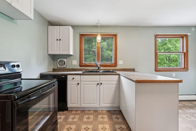 705707 Maine Ave, Farmingdale, ME 04344 - kitchen with black electric range, a sink, a peninsula, light floors, and white cabinets