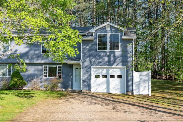 107 Tidy Rd Unit A & B, Eliot, ME 03903 - traditional-style home featuring dirt driveway, a garage, and a front lawn