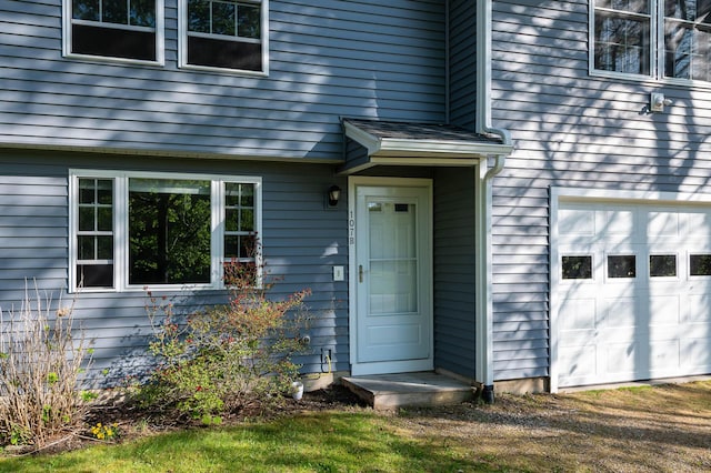 107 Tidy Rd Unit A & B, Eliot, ME 03903 - doorway to property featuring an attached garage