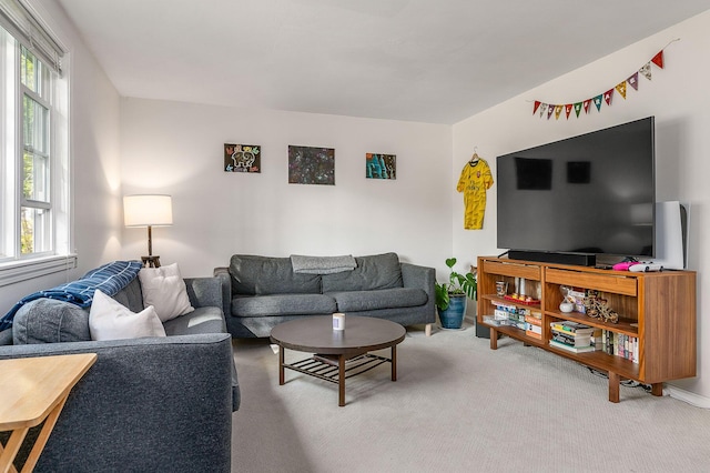 107 Tidy Rd Unit A & B, Eliot, ME 03903 - living area with plenty of natural light and carpet