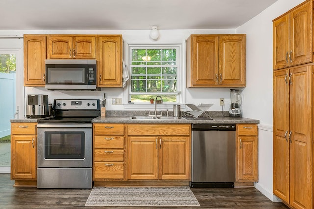 107 Tidy Rd Unit A & B, Eliot, ME 03903 - kitchen featuring stainless steel appliances, a sink, dark wood-style floors, and dark countertops