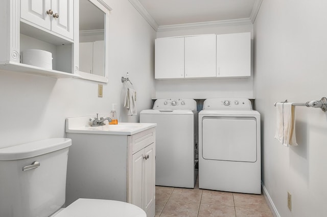 107 Tidy Rd Unit A & B, Eliot, ME 03903 - laundry area with washing machine and dryer, crown molding, light tile patterned flooring, and baseboards