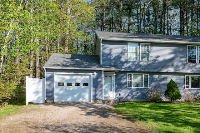 107 Tidy Rd Unit A & B, Eliot, ME 03903 - colonial-style house featuring an attached garage, driveway, and a front lawn