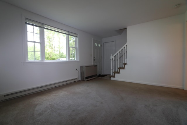 107 Tidy Rd Unit A & B, Eliot, ME 03903 - carpeted foyer entrance featuring a baseboard heating unit, stairway, and baseboards