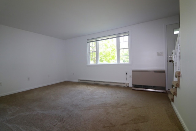 107 Tidy Rd Unit A & B, Eliot, ME 03903 - carpeted empty room featuring baseboards and a baseboard radiator