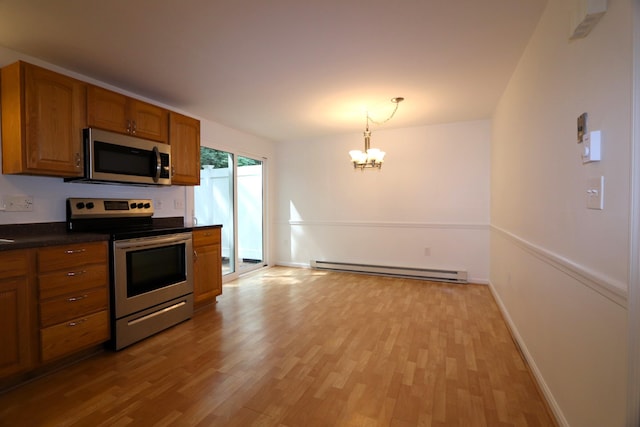 107 Tidy Rd Unit A & B, Eliot, ME 03903 - kitchen featuring appliances with stainless steel finishes, a baseboard radiator, brown cabinetry, and light wood-style floors