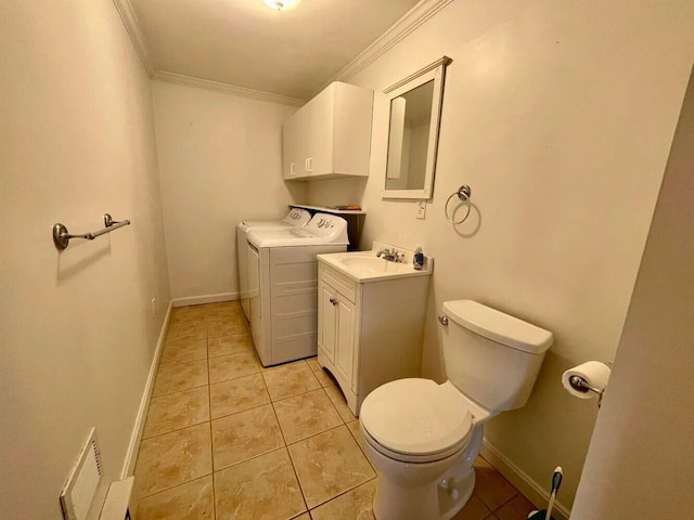 107 Tidy Rd Unit A & B, Eliot, ME 03903 - bathroom with washing machine and dryer, vanity, toilet, crown molding, and tile patterned flooring