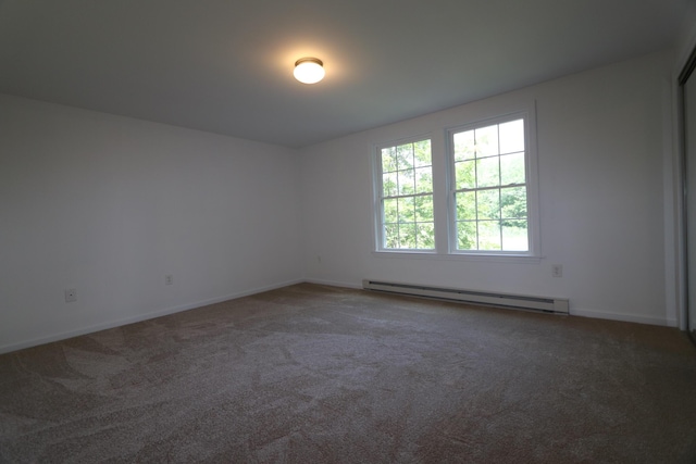 107 Tidy Rd Unit A & B, Eliot, ME 03903 - carpeted spare room featuring a baseboard radiator and baseboards