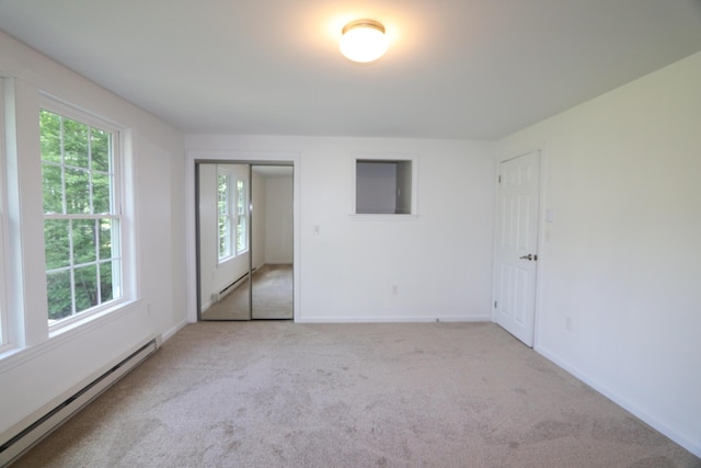 107 Tidy Rd Unit A & B, Eliot, ME 03903 - carpeted empty room with a baseboard radiator and baseboards