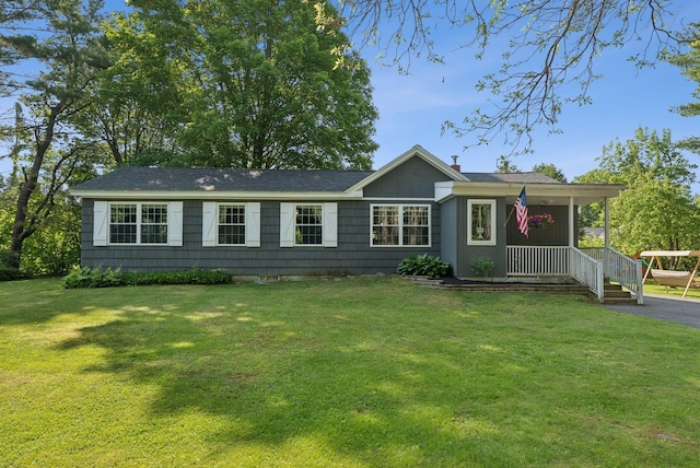 83 E Cote St, Lewiston, ME 04240 - ranch-style home with a front lawn