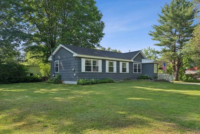 83 E Cote St, Lewiston, ME 04240 - single story home with a front yard