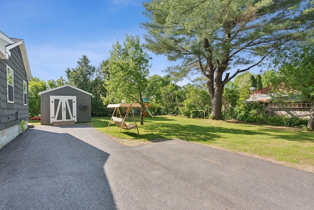 83 E Cote St, Lewiston, ME 04240 - view of green lawn with a playground