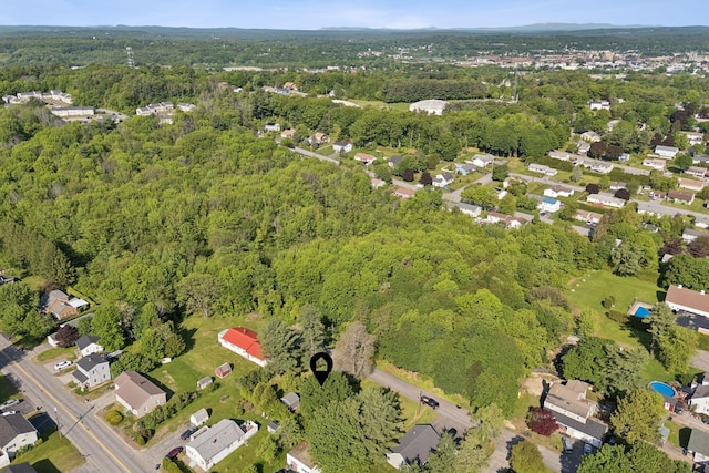 83 E Cote St, Lewiston, ME 04240 - aerial view of property and surrounding area featuring a heavily wooded area
