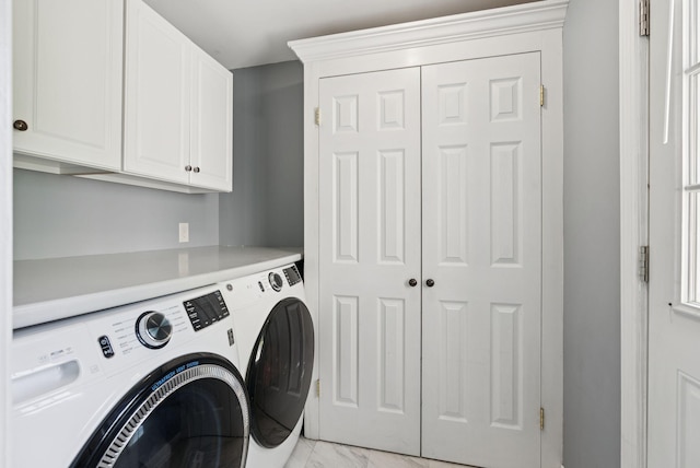 83 E Cote St, Lewiston, ME 04240 - laundry area featuring cabinet space and washing machine and clothes dryer