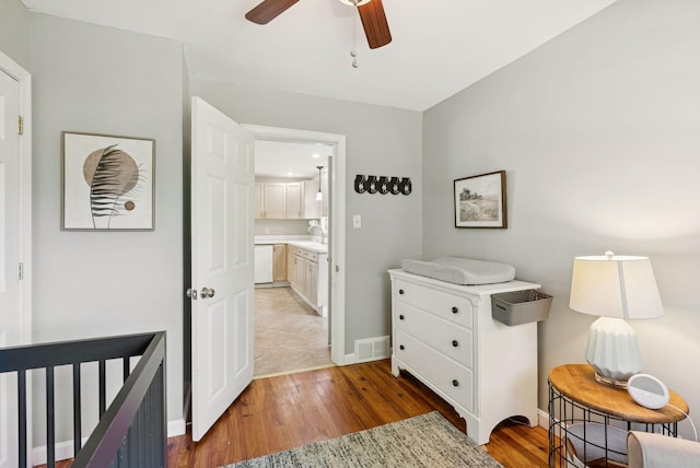83 E Cote St, Lewiston, ME 04240 - bedroom with light wood-style flooring, baseboards, and ceiling fan